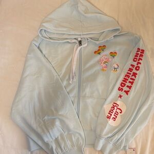 Care bear; hello kitty hoodie. New without tag tags. Sz L